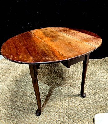 Lot 496 - An 18th century Honduras mahogany drop leaf...