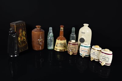 Lot 137 - Two stoneware bed warmers together with Wade...