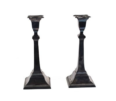 Lot 370 - A pair of sterling silver candlesticks in the...