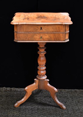 Lot 512 - A 19th century burr walnut sewing table, the...