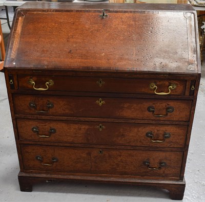 Lot 483 - An 18th-century Georgian slant-front oak...