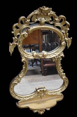 Lot 471 - A 19th century Rococo Revival giltwood and...