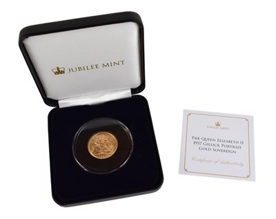 Lot 18 - A Royal Mint full gold sovereign, dated 1957,...