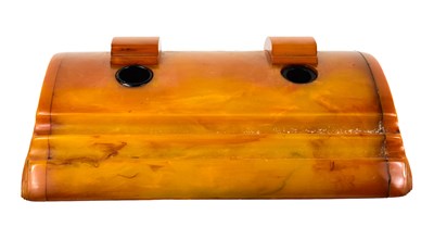 Lot 150 - An Art Deco period amber bakelite inkstand,...