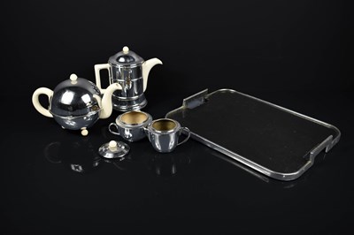 Lot 139 - An art Deco tea set and tray comprising a...
