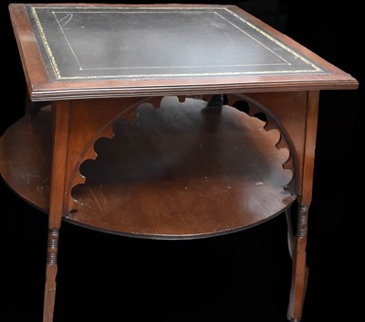 Lot 501 - An Edwardian mahogany tier table with a gilt...