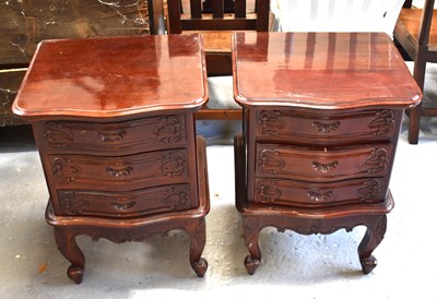 Lot 475 - A pair of French-style mahogany bedside...