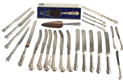 Lot 328 - A group of silver handled knives to include,...