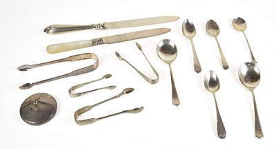 Lot 357 - A group of silver to include Georgian sugar...