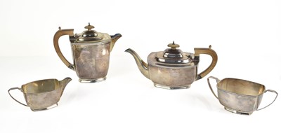 Lot 375 - An Art Deco silver tea set, comprising teapot,...