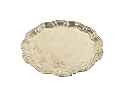 Lot 356 - An antique silver salver with pie crust rim,...
