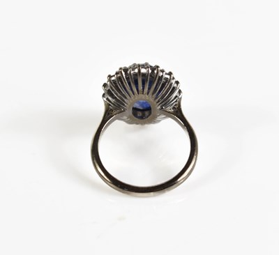 Lot 6 - An 18ct white gold, diamond and sapphire ring,...