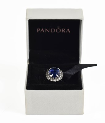 Lot 6 - An 18ct white gold, diamond and sapphire ring,...