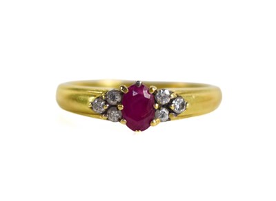 Lot 197 - An 18ct gold, pink sapphire and diamond ring,...