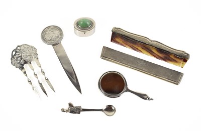 Lot 334 - A selection of silver collectables to include...