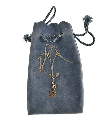 Lot 44 - A 9ct gold pendant necklace, the pendant in...
