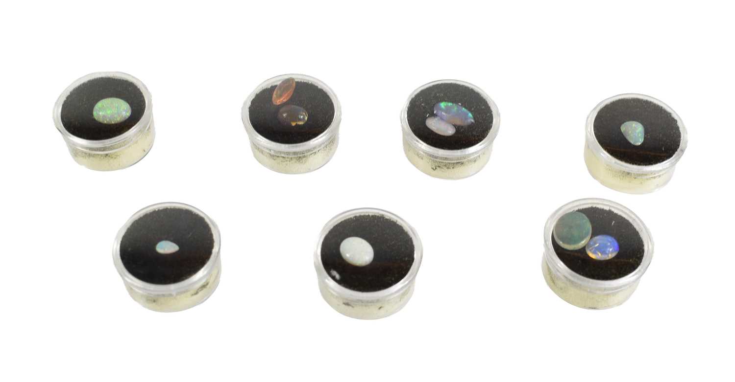 Lot 40 - A selection of loose cabochon opals, including...