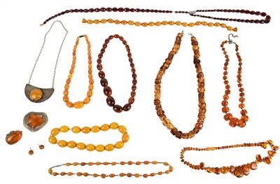 Lot 134 - A selection of amber and faux amber necklaces...