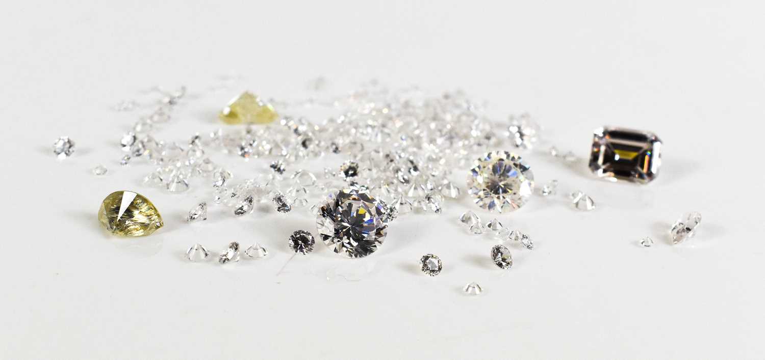 Lot 36 - A group of loose gemstones, mostly cubic...