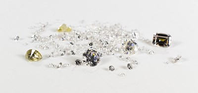 Lot 36 - A group of loose gemstones, mostly cubic...