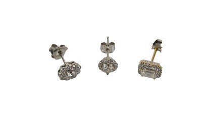 Lot 201 - A single platinum and diamond stud earring,...
