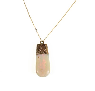 Lot 86 - A 9ct gold and opal pendant necklace, the...