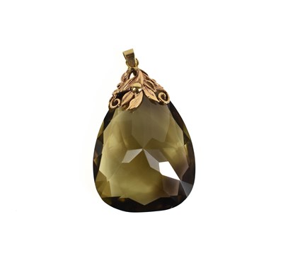 Lot 91 - A 9ct gold, smoky quartz pear drop pendant,...