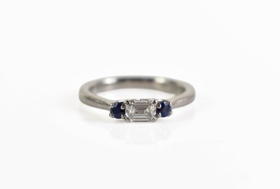 Lot 238 - A platinum, diamond and sapphire ring, the...