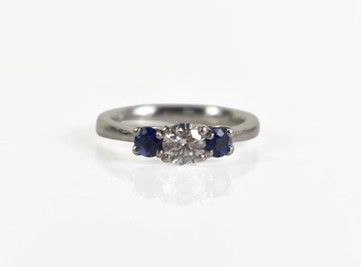 Lot 239 - A platinum, diamond and sapphire ring, the...