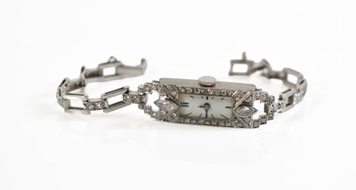 Lot 286 - An Art Deco platinum Royce Watch Co., cocktail...