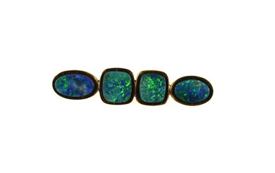Lot 156 - A gold and opal set brooch, the gold unmarked...