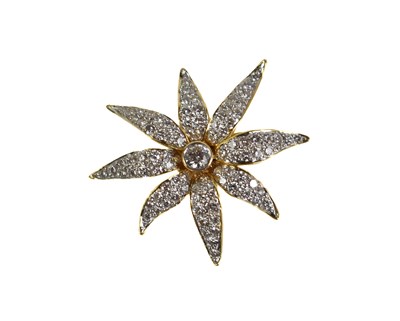 Lot 11 - An 18ct gold and diamond set pendant in the...