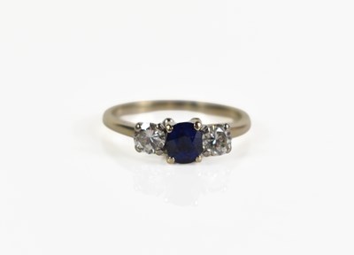 Lot 188 - A white metal, diamond and sapphire ring, the...