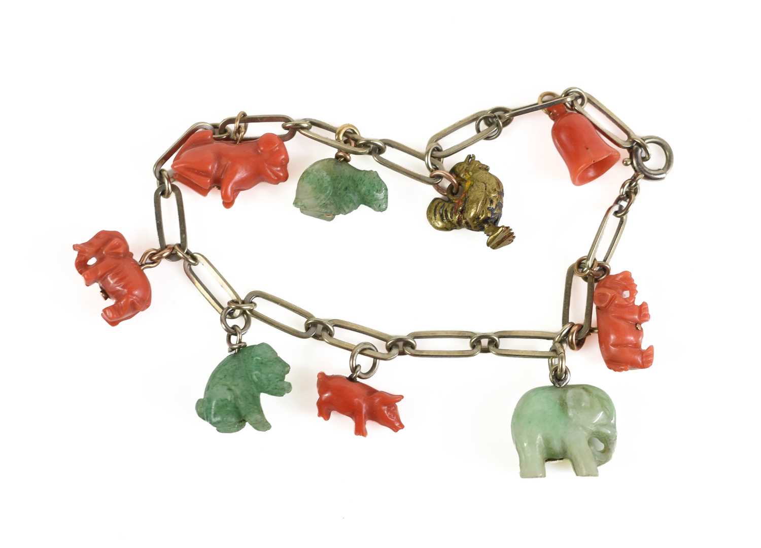 Lot 4 - A Chinese yellow metal, coral and jade...