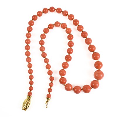 Lot 263 - A substantial coral and gold bead necklace,...