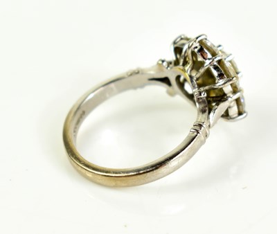 Lot 17 - An 18ct white gold and diamond flowerhead ring,...