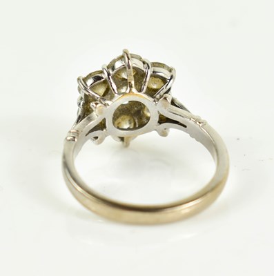 Lot 17 - An 18ct white gold and diamond flowerhead ring,...