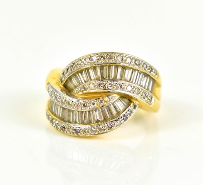 Lot 240 - A 18ct gold and diamond cross over ring, set...