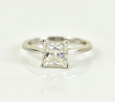 Lot 161 - A 14ct white gold and cubic zirconia emerald...