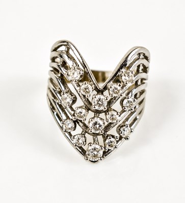 Lot 13 - A 14ct white gold and diamond V-form cluster...