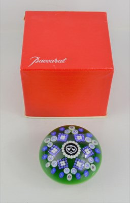 Lot 220 - A Baccarat gridel and millefiori paperweight...