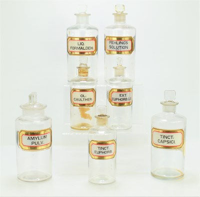 Lot 10 - A group of seven antique clear glass...