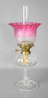 Lot 325 - A 19th century glass oil lamp, the font of...