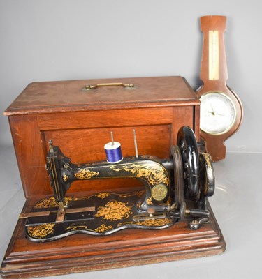Lot 43 - An antique Singer Sewing machine, with...