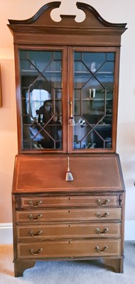 Lot 210 - A mahogany bureau bookcase, the top with...