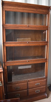 Lot 216 - A Globe Warnike style glazed cabinet composed...
