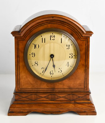 Lot 44 - An early 20th century walnut mantle clock,...