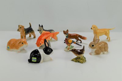 Lot 344 - A group of John Beswick and Beswick porcelain...