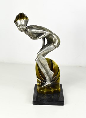Lot 3 - An Art Deco style figure of a lady, resin and...