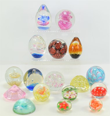 Lot 278 - A group of glass paperweights of various style...